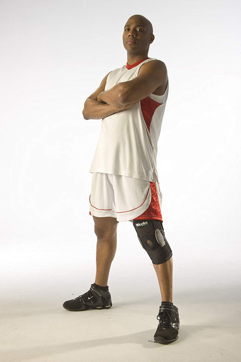 Load image into Gallery viewer, Mueller Adjustable Hinged Wraparound Knee Brace.