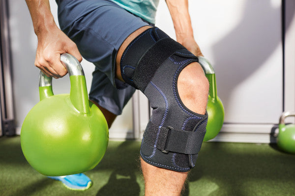 Load image into Gallery viewer, Actimove Knee Brace, Wrap Around, Simple Hinges, Condyle Pads