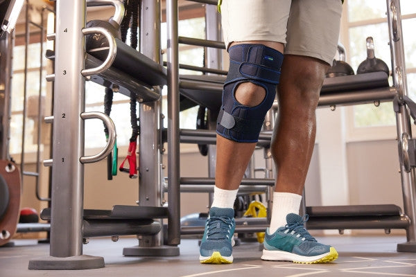 Load image into Gallery viewer, Actimove Knee Brace, Wrap Around, Polycentric Hinges, Condyle Pads
